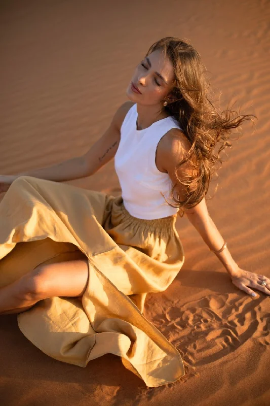 Linen long flowing skirt with slit ruffled skirt detail